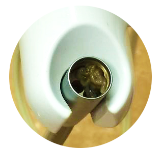 A dental unit waterline is clogged with biofilm